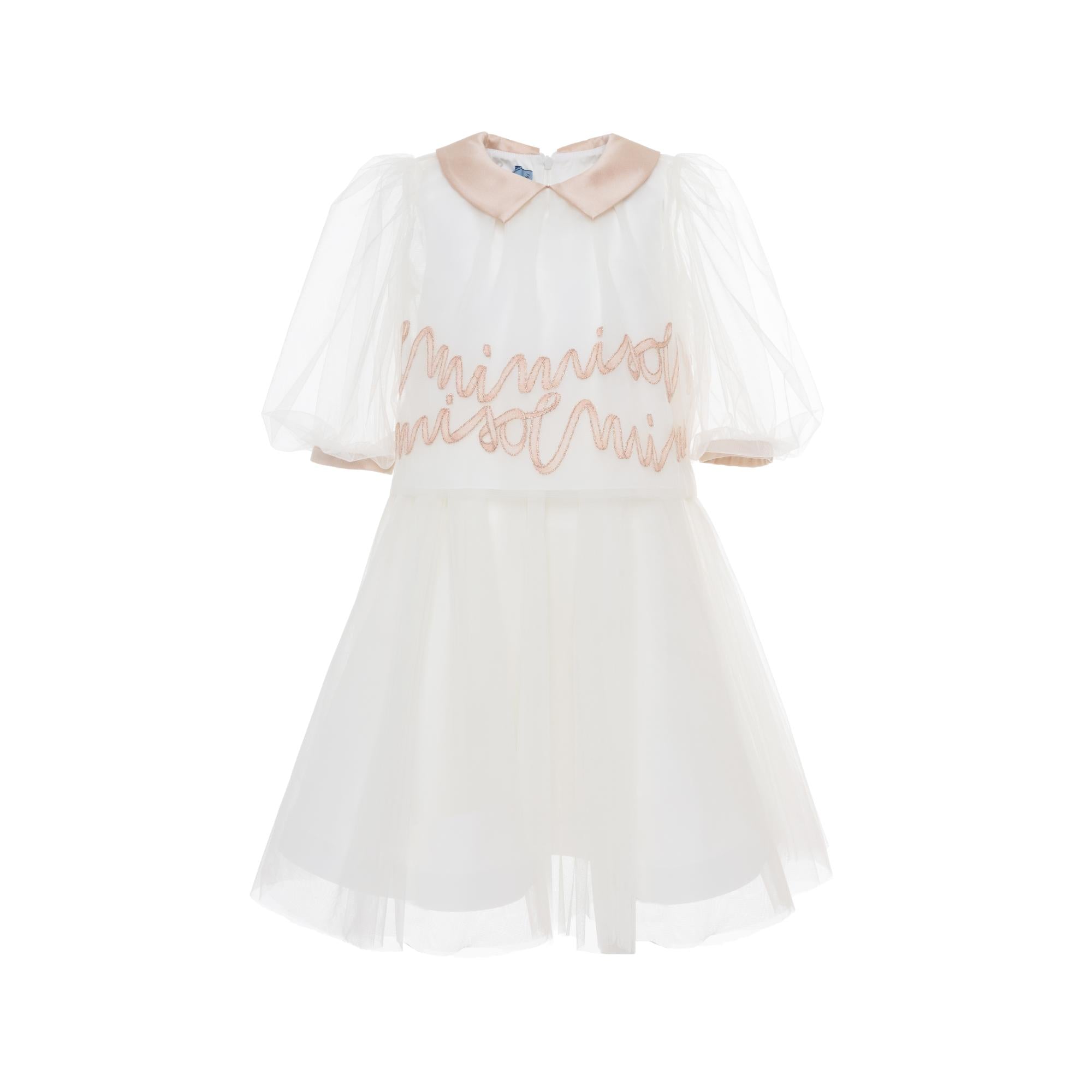 White kids' dress with pink Peter Pan collar, pink puffed sleeve cuffs, and pink embroidered text on the bodice.