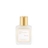 A front view of frosted glass bottle of Maison Francis Kurkdjian Paris "À la rose" Scented Hair Mist (70ml) with a gold cap and a white label featuring pink and gold lettering.