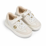 High-angle quarter view of a pair of kids' Michael Kors lifestyle runners, displaying the dynamic layered geometric design and soft pink accent lines.