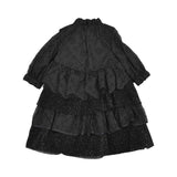 MIMISOL girls black tiered dress with broderie anglaise details, sequins, long sleeves, and ruffled neckline.