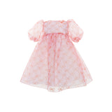 MIMISOL girl's pink sheer organza dress featuring an all-over bow pattern, short puff sleeves, and a flared skirt.