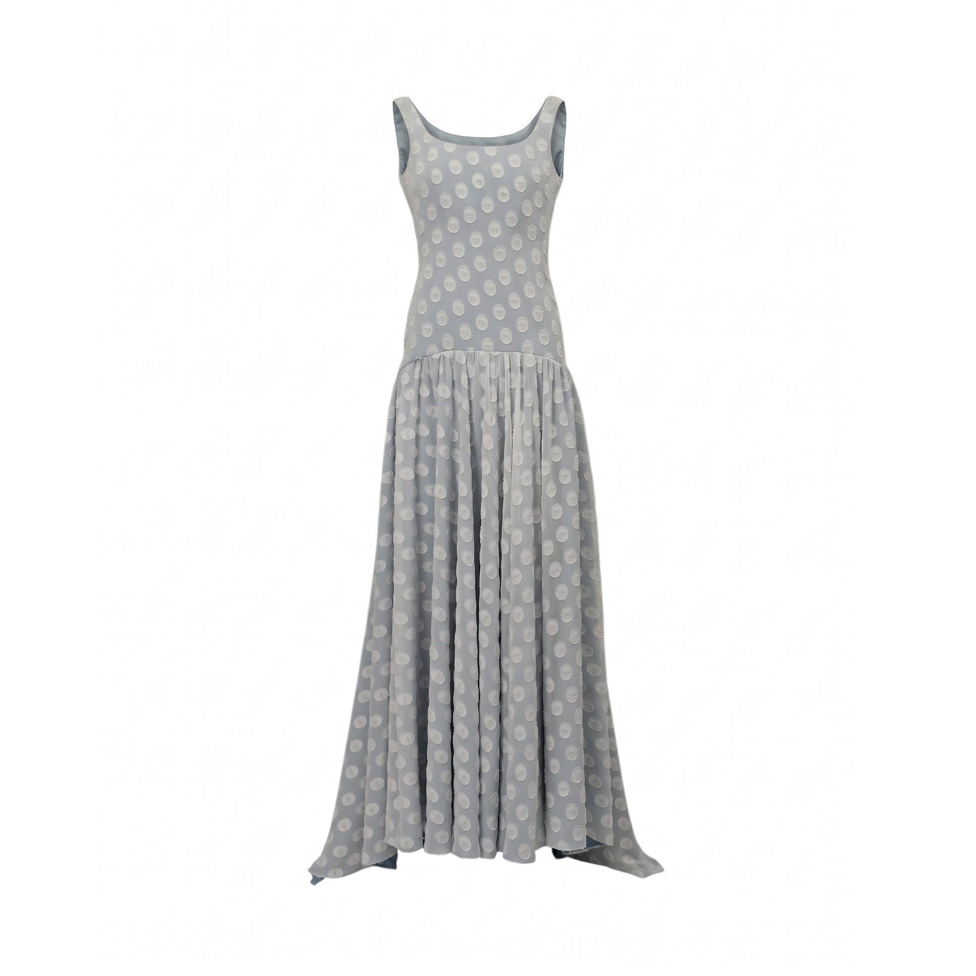 Light blue sleeveless maxi dress with a fitted bodice, dropped waist, and a full skirt featuring a white raised polka dot pat