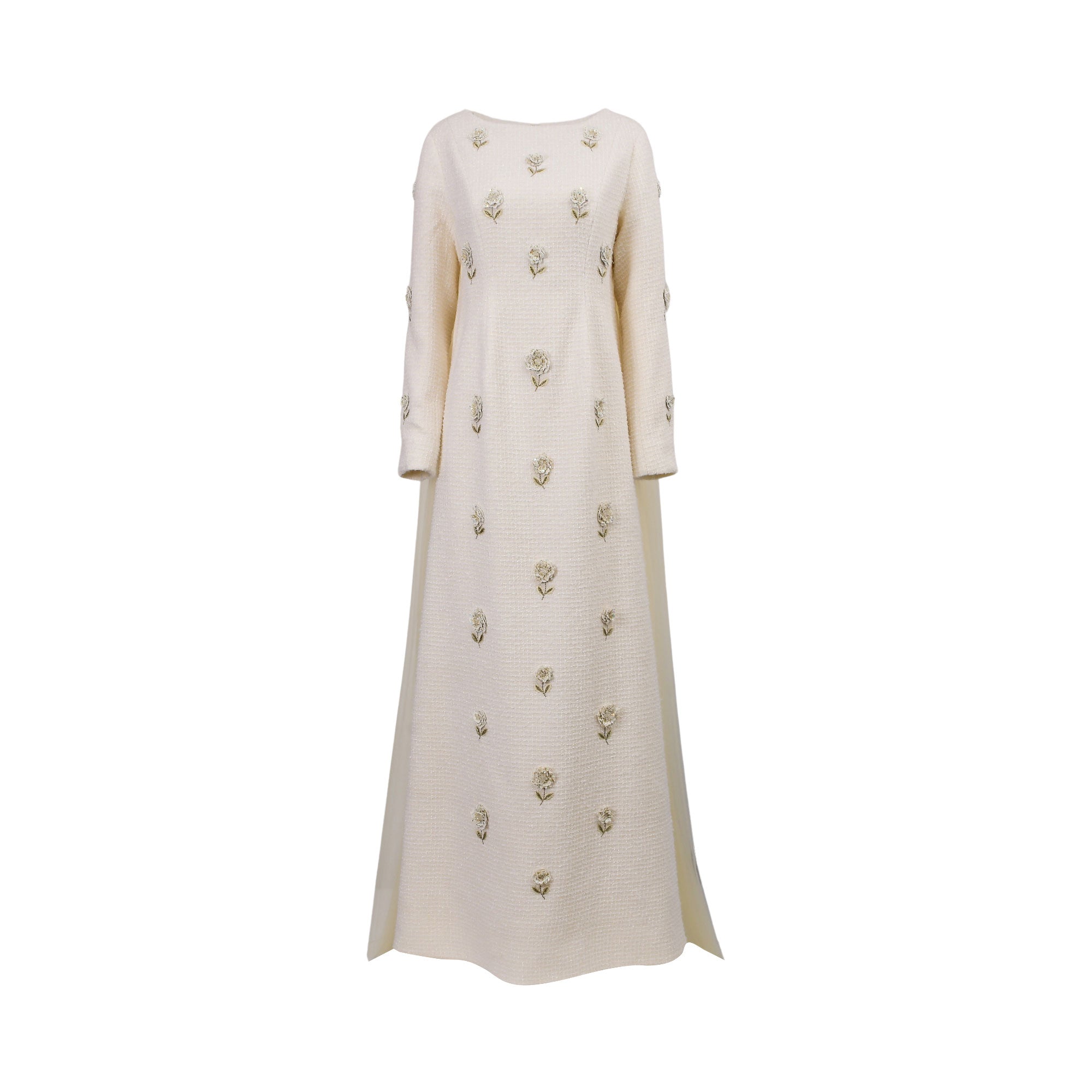 Off white long dress with boat neckline, full-length sleeves, textured fabric, and scattered floral appliques.
