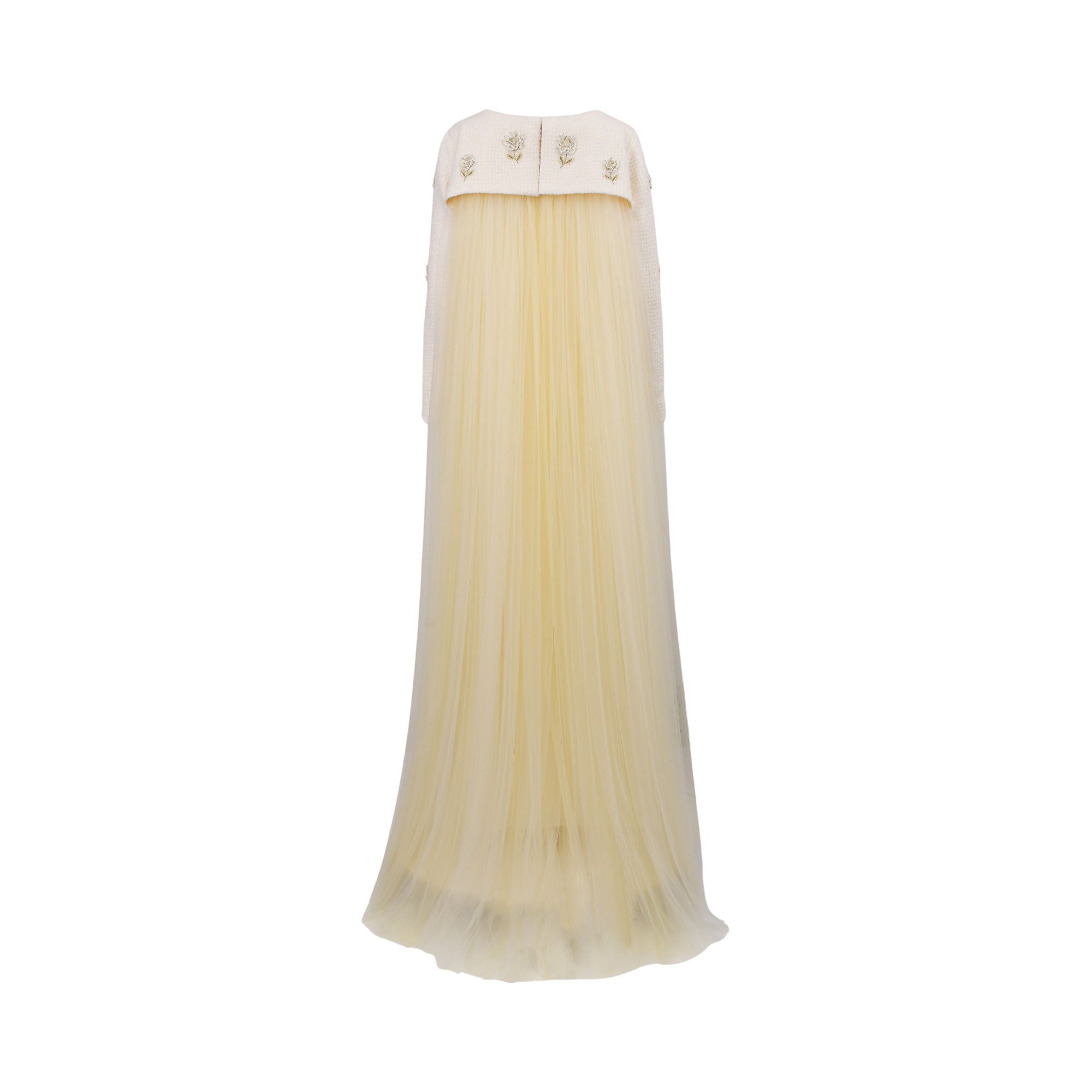 Off-white dress with textured top, long sleeves, and gold-toned floral embroidery. Full, pale yellow sheer tulle skirt.