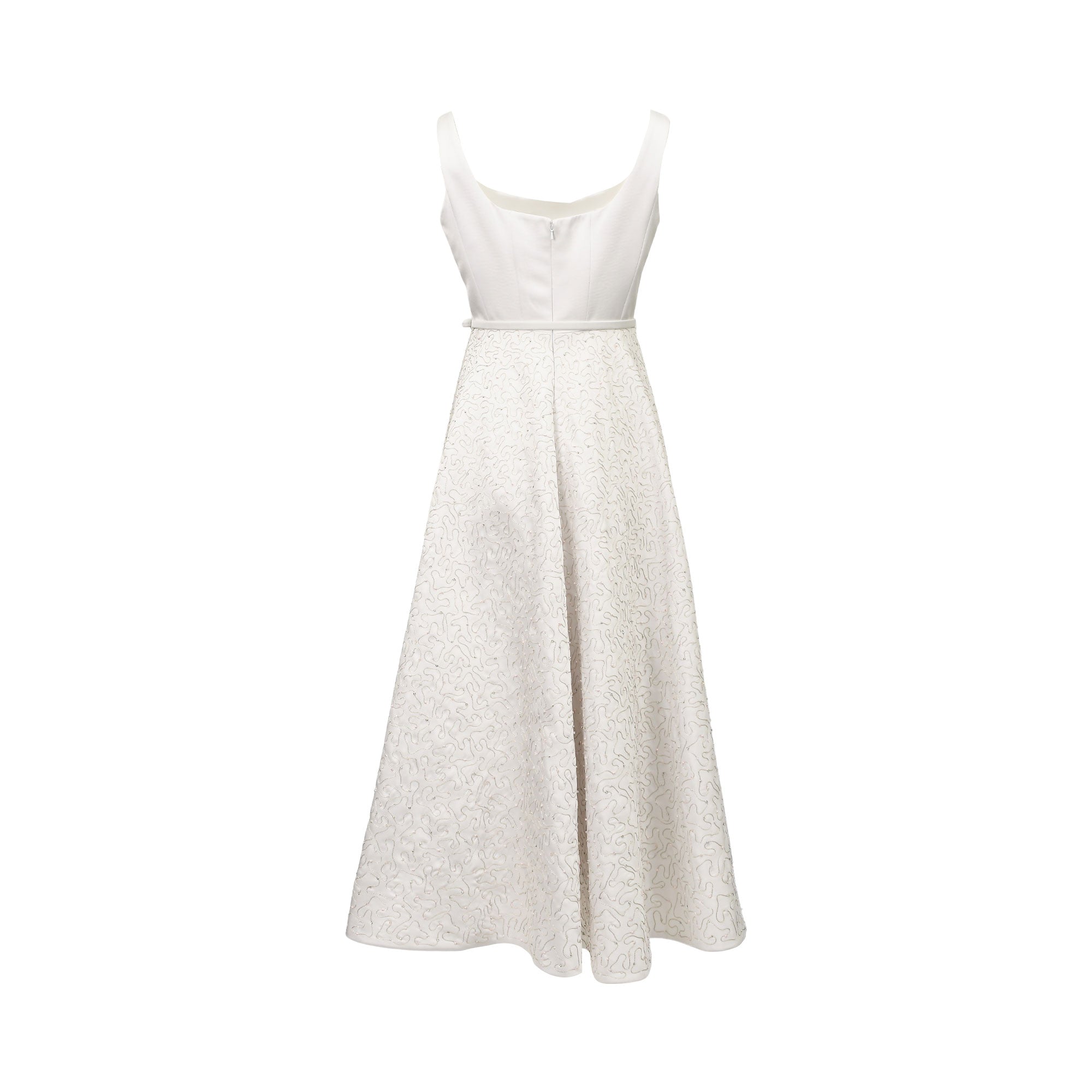 White sleeveless maxi dress, back view. Wide straps, smooth bodice, thin waist belt, and full skirt with intricate raised pat