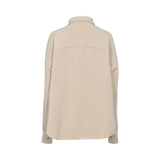 Beige long-sleeve polo top by MOMONI with button placket, relaxed fit, and minimalist design.