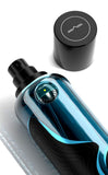 M.INT Moon Glade Eau de Parfum 75ml bottle with black box packaging and teal wave details, showcasing a fresh and contemporary fragrance design, Find Online Today.