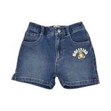 Close-up of the baby denim shorts featuring a button fly, five-pocket design, and the Moschino Teddy Bear logo on the left thigh.