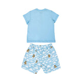 The back of the Moschino Baby set showing the plain light blue T-shirt and the all-over printed shorts with back pockets.