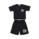 Front view of Moschino kids' two-piece set featuring black T-shirt with pocket logo and matching shorts.