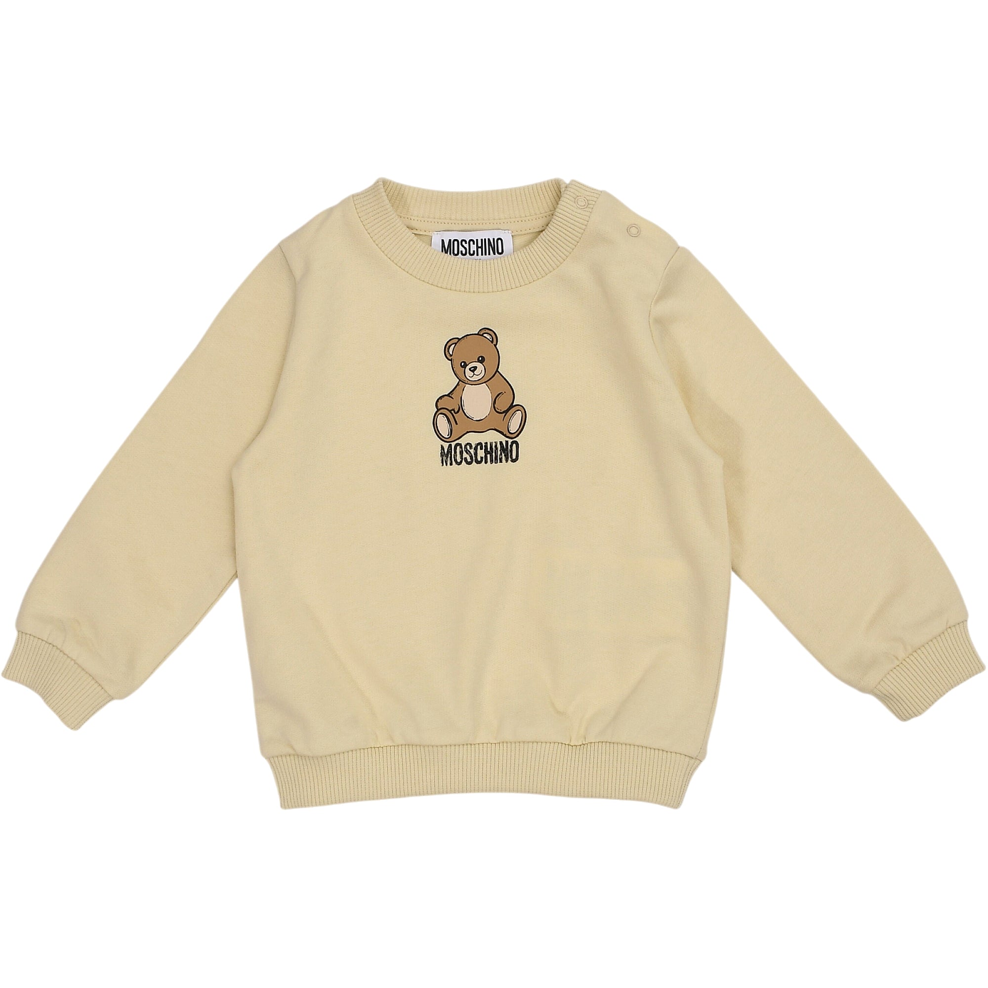 Beige crew neck sweatshirt with a brown teddy bear graphic and 'MOSCHINO' text on the front, and two snap buttons on the left
