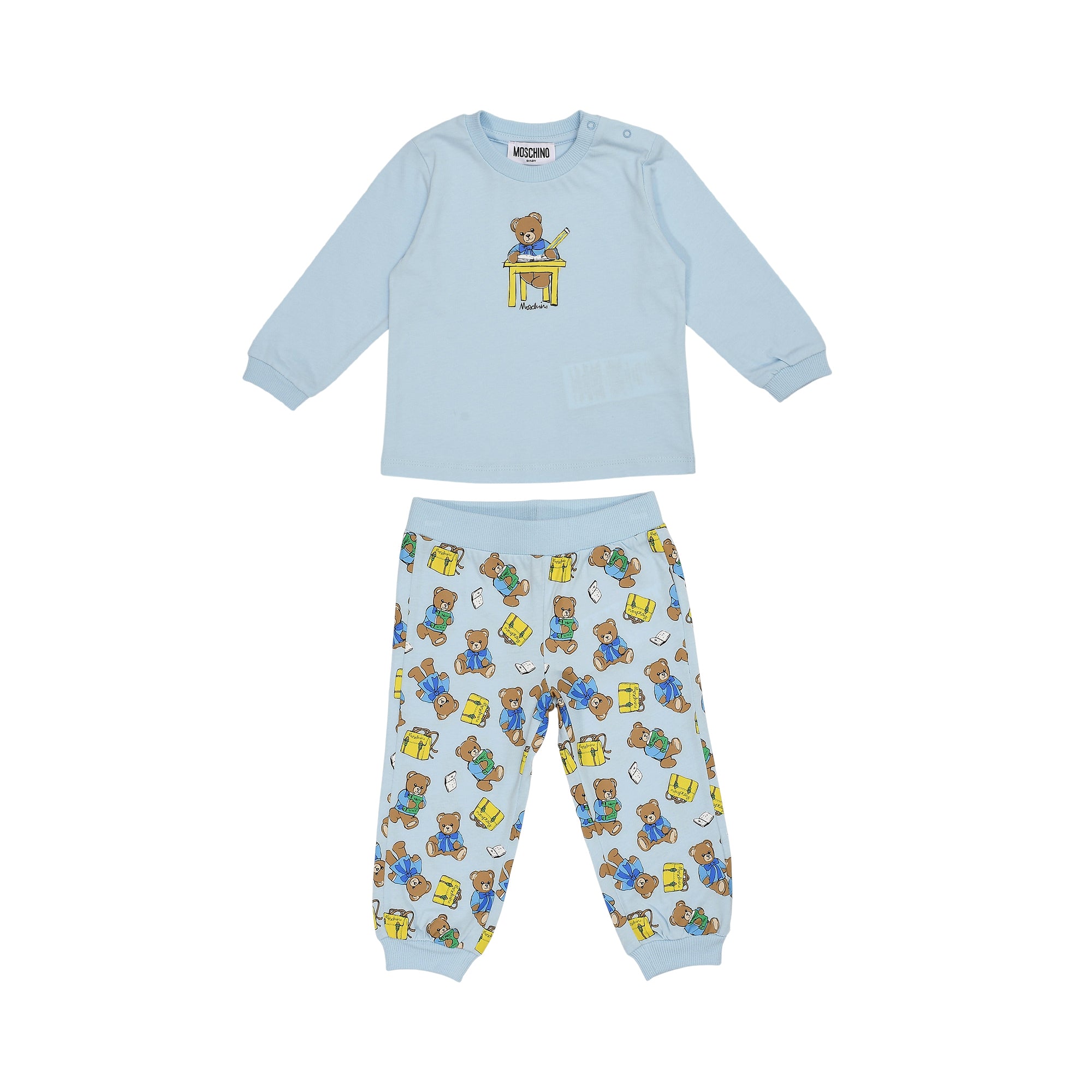 Light blue two-piece jogging suit with a teddy bear graphic on the top and an all-over teddy bear print on the bottoms.