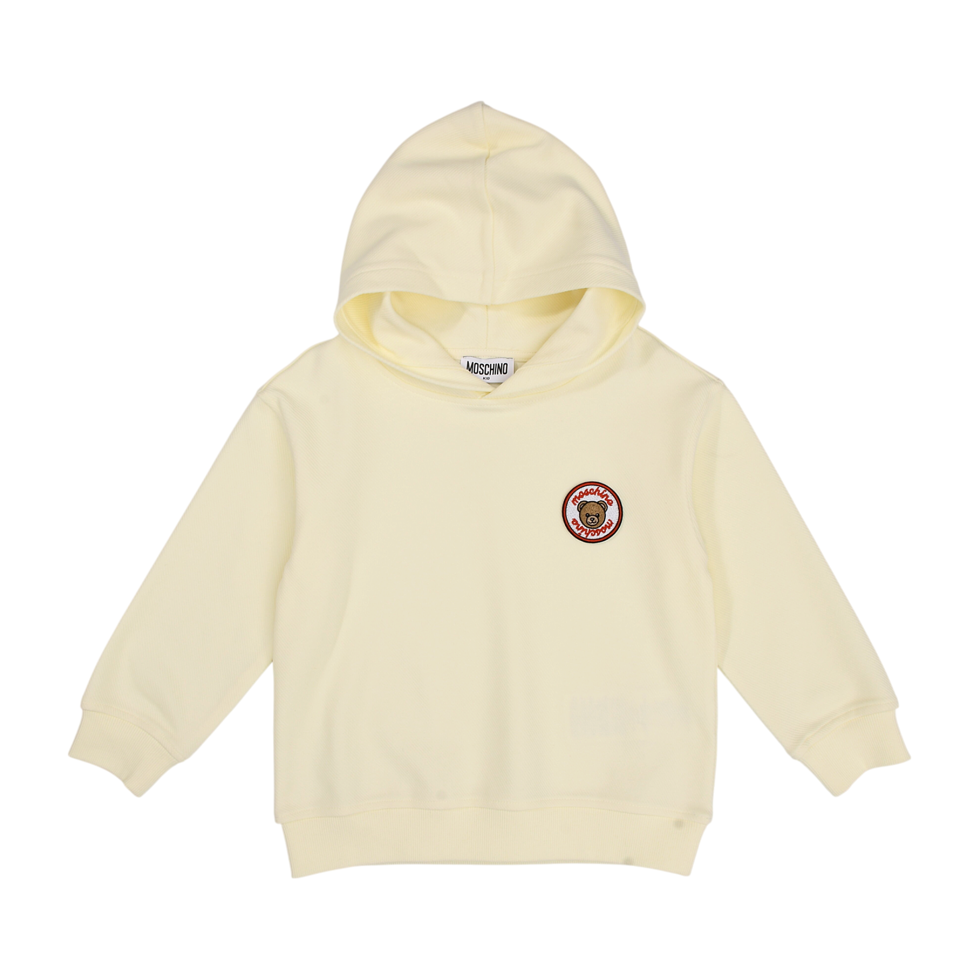 Cream long-sleeved hoodie with ribbed cuffs and hem. Features a circular patch on the left chest with a teddy bear and 'Mosch