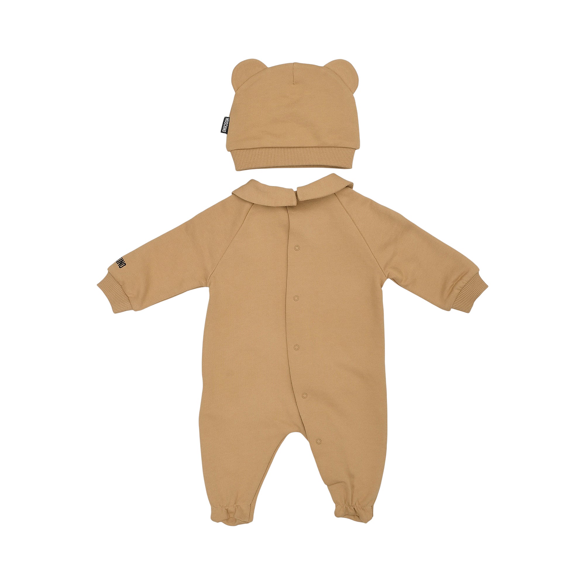 Brown sleepsuit with rounded collar, snap buttons, ribbed cuffs, footed legs, and sleeve logo. Matching beanie with bear ears