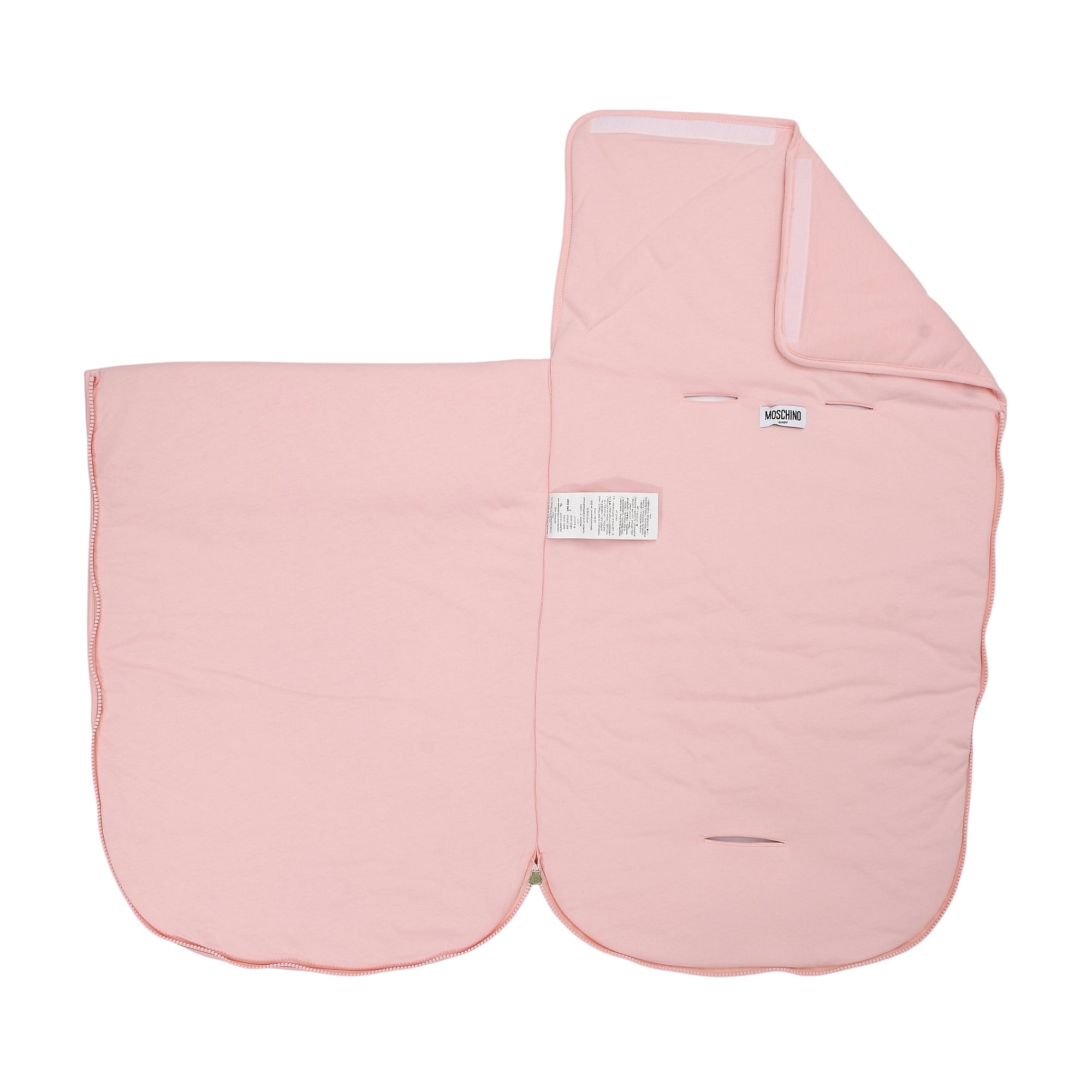 Light pink padded baby nest, laid flat, with a folded top panel, white velcro, two strap slits, a Moschino label, and scallop