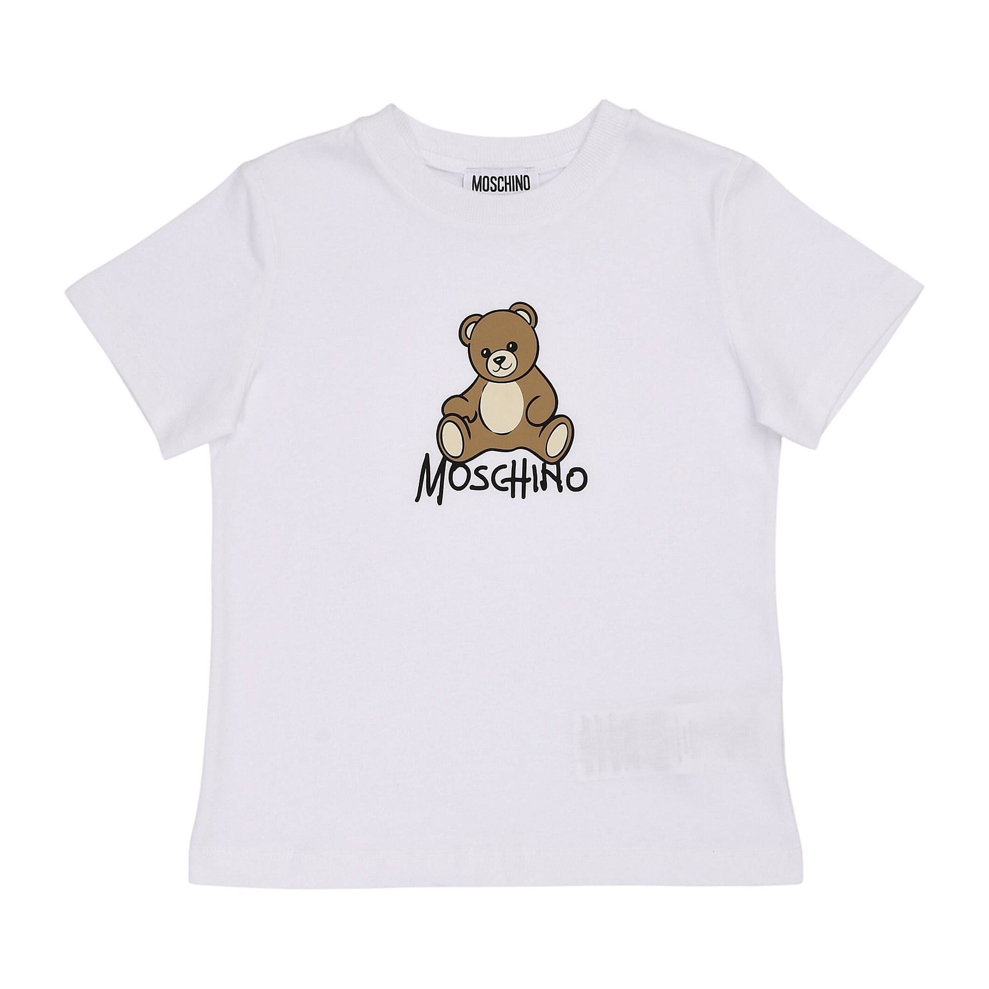 White short-sleeved T-shirt with a brown teddy bear graphic and black 'Moschino' lettering on the front.