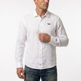 Off-white long-sleeved men's shirt with a classic collar, button-front closure, and a small brown embroidered emblem on the l
