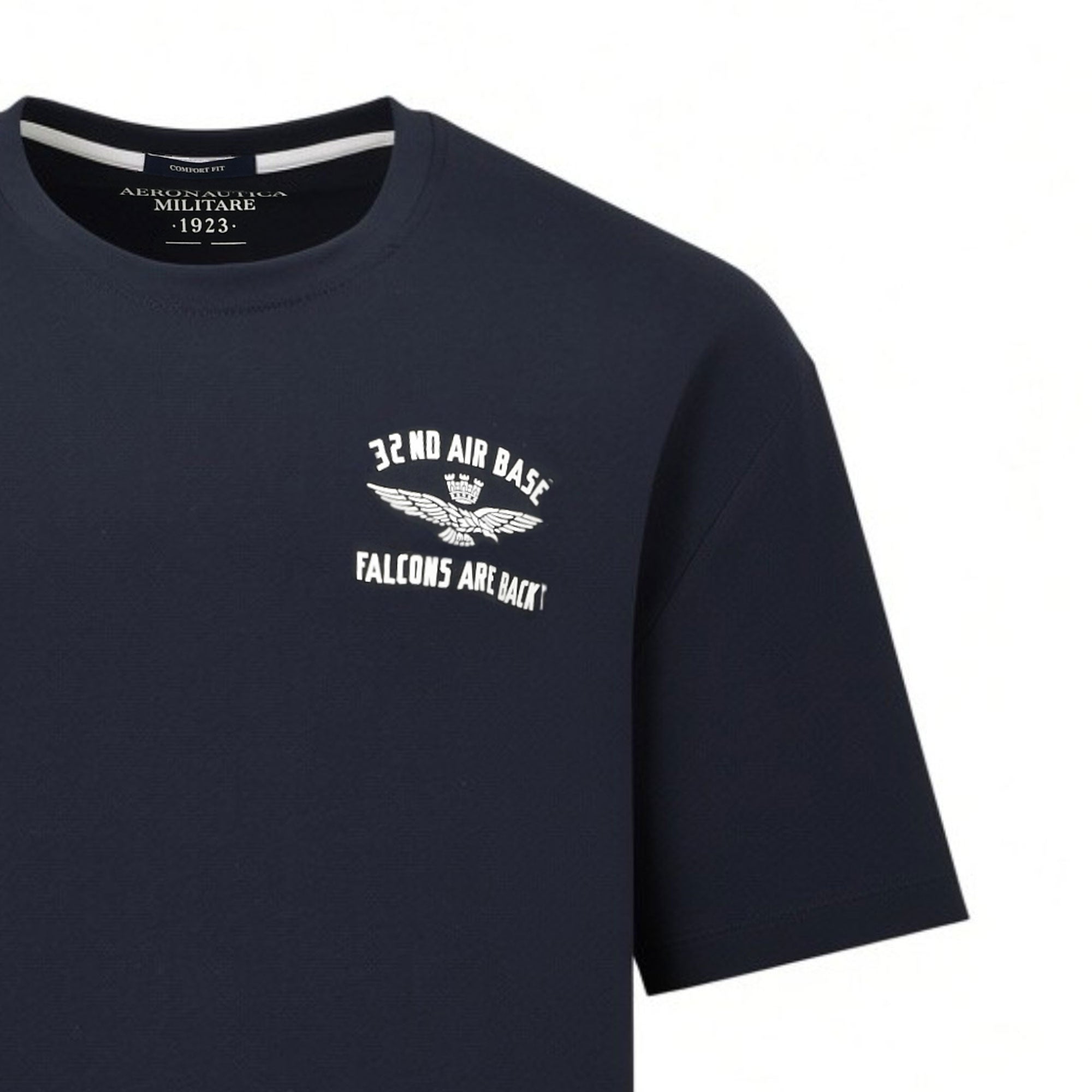 Navy blue short-sleeve crew neck t-shirt with a white '32 ND AIR BASE' winged emblem and 'FALCONS ARE BACK!' graphic on the c