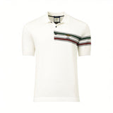 Off-white knit polo shirt with a two-button placket. Left chest has diagonal green, gray, burgundy stripes, gold-toned emblem
