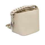 the MUNI Braided Handle Bucket Bag, a sophisticated blend of sculptural design and artisanal texture.