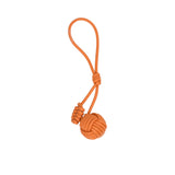 Leather bag charm by MUNI featuring a large spherical monkey fist knot at the bottom, smaller coiled knot accents, and a long attachment loop against a white background.