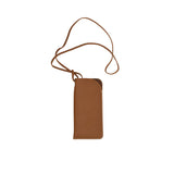 A slim, vertical yellow leather glasses pouch by MUNI with a matching thin neck strap, shown against a white background.