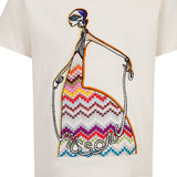 Ivory t-shirt with an embroidered stylized woman in a colorful zigzag dress, holding a rope that spells "Missoni".