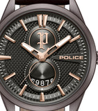Extreme close-up of the micro-textured gunmetal dial face, detailing the raised rose gold index wedges, the skeletonized hands with white luminescent paint, the crest logo, and the lower rolling calendar date aperture.