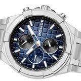 Extreme close-up of the detailed face, highlighting the deep blue waffle-grid dial pattern, silver luminescent indices, and the concentric circles on the dual time sub-dials.