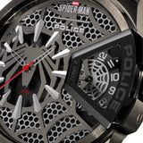 Extreme close-up of the asymmetric dial face, detailing the laser-cut spider web, silver claw indices, red Zone 1 seconds hand, spider emblem, and the web-patterned rotating discs inside the Zone 2 window.