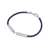 Focused studio photograph showing the polished silver stainless steel magnetic lock closure mechanism on the Cerruti 1881 blue leather bracelet.