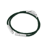 Focused studio photograph showing the polished silver stainless steel magnetic lock closure mechanism on the Cerruti 1881 green leather bracelet.