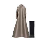 The back of a long, A-line structured silk-satin coat in bronze with a smooth, reflective finish and a clean tailored silhouette.