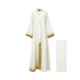 Front view of a shimmering cream Maison Darine abaya with gold sequin embroidery on the wide sleeves and lower front panel, shown with a matching white sheila.