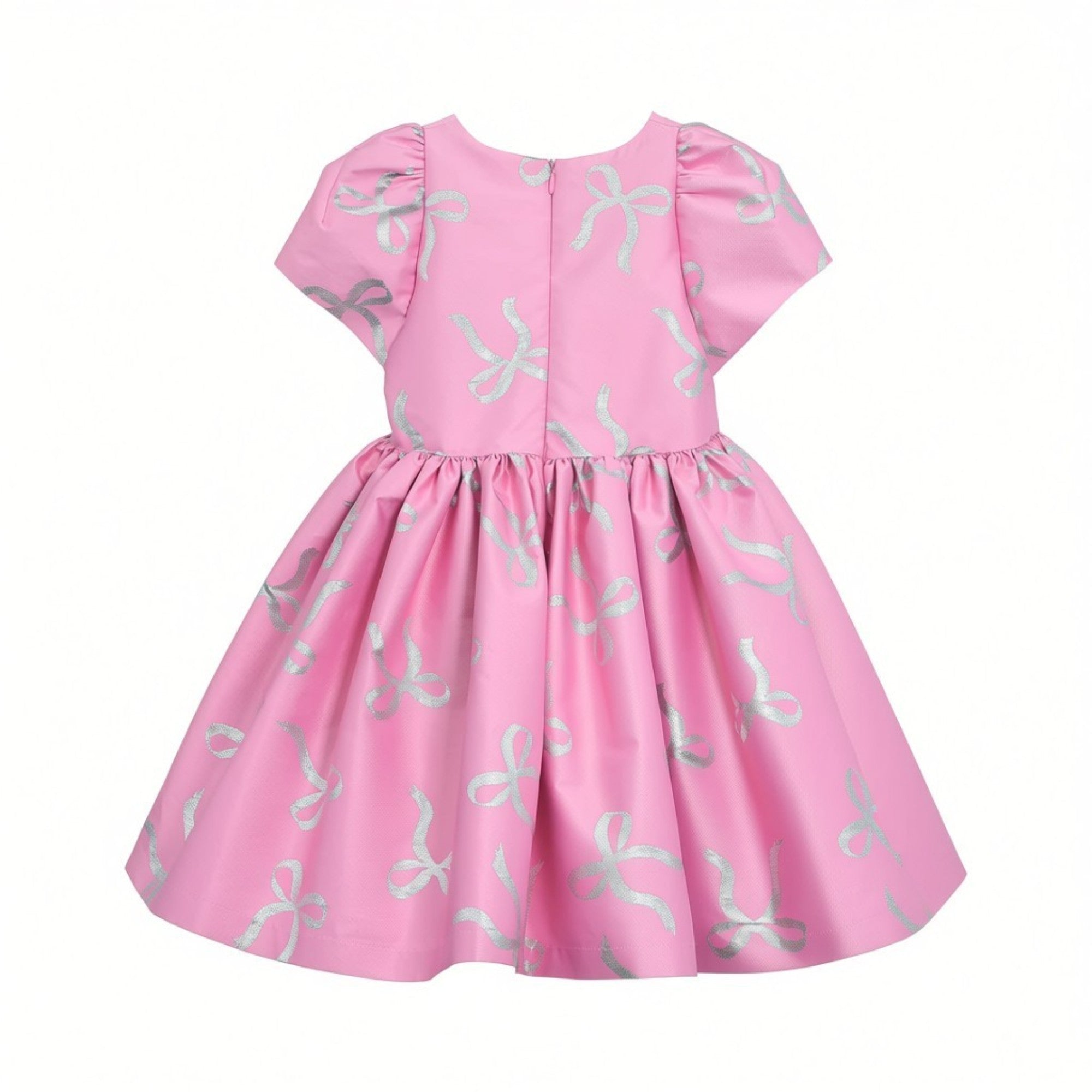 Back full-length view of the Mamaluma girls pink dress highlighting a large, structured satin statement bow at the waistline and a clean, concealed zipper closure.