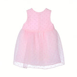 Back view of the Mamaluma girls sleeveless Pink Swiss dot dress highlighting the gathered tulle skirt waistline and a clean, concealed zipper closure.