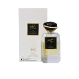 Marwa Ghassan Lior Extrait De Parfum 100ml bottle with light golden fragrance next to its white textured luxury box featuring gold MG branding.