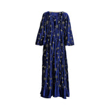 Back view of the Marwa Ghassan navy blue velvet abaya showcasing the rich texture of the fabric and the detailed gold floral embroidery across the gown.