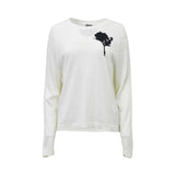 Max Mara long-sleeve virgin wool sweater featuring a black abstract floral or ink-blot graphic on the upper left chest.