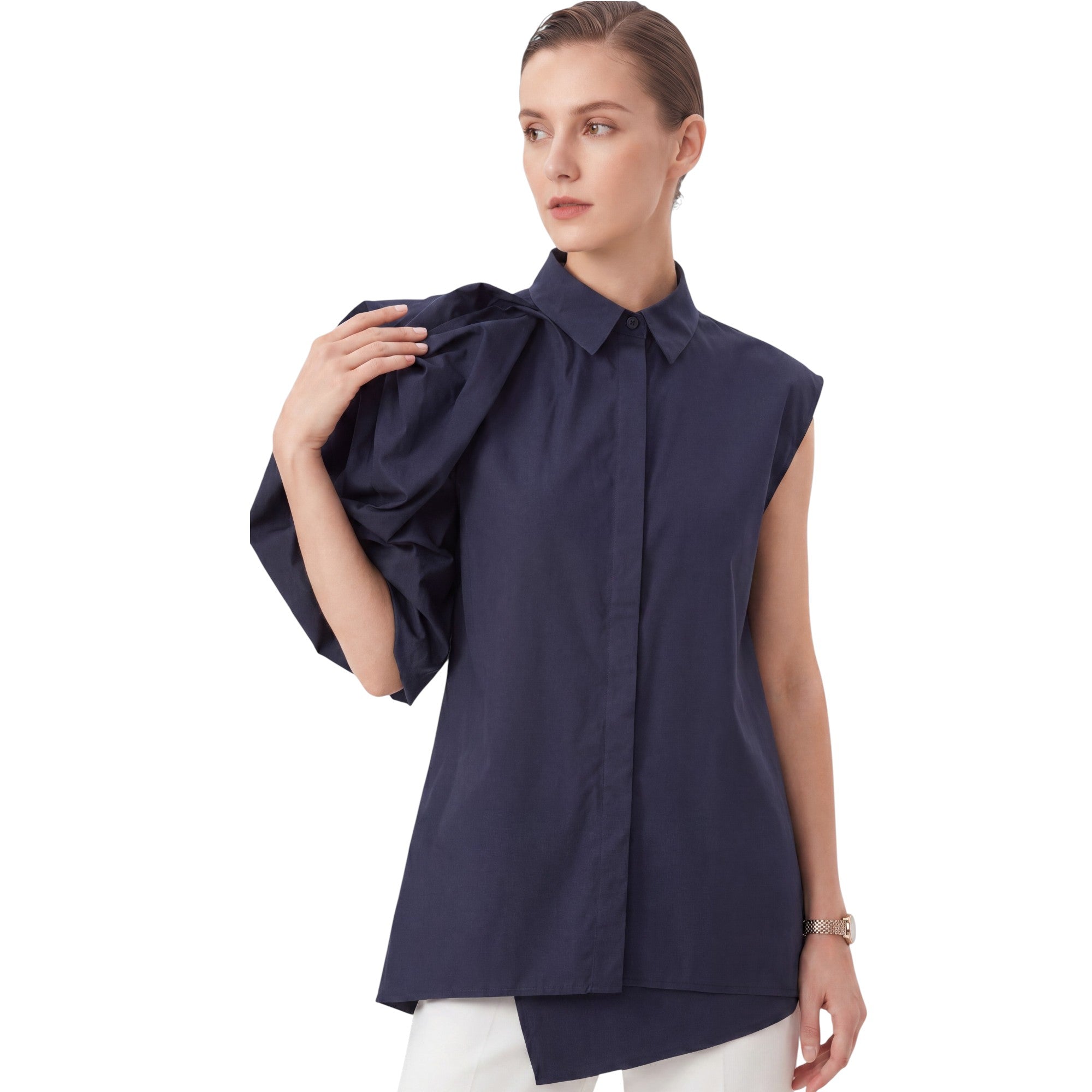 Studio shot of a female model wearing the navy blue Meimeij asymmetric poplin blouse, showcasing the high-fashion contrast between the sleeveless side and the voluminous draped sleeve.