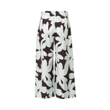 Rear view of Meimeij floral print wide-leg trousers highlighting the gathered elasticated back waistband and the continuous oversized graphic print against a clean white background.