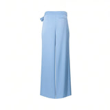 Rear view of Meimeij light blue wide-leg trousers highlighting the smooth fabric drape, tailored waistband construction, and a single right-side horizontal welt pocket against a clean white background.