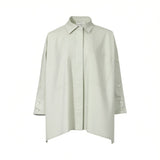 Front studio shot of the Meimeij women's oversized utility shirt in sage green, highlighting the large geometric pockets and hidden placket from BLUE SALON shop.
