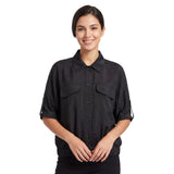 Front view of a smiling model wearing the Meimeij black elastic-hem blouse with matching dark trousers from BLUE SALON shop.
