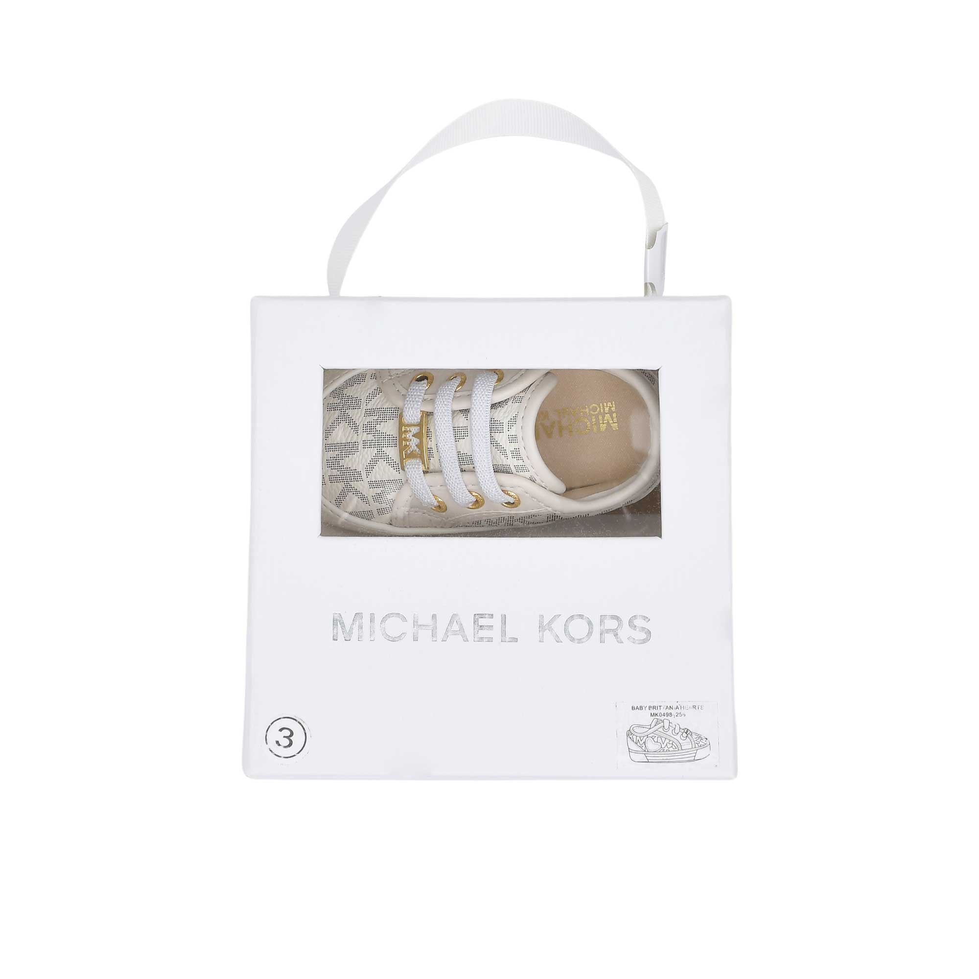 Top-down view of a pair of off-white Michael Kors baby crib shoes nestled securely inside a premium open white cardboard gift box with dual compartments.