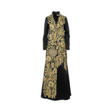Front view of a black Mijade Fashion evening gown featuring heavy gold geometric and floral embroidery on the front.