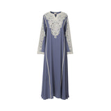 Front view of a Mijade Fashion slate blue jalabiya featuring silver geometric embroidery on the chest and sleeves with white piping details.