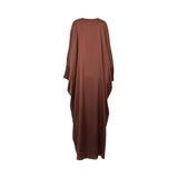 Back view of a floor-length brown satin kaftan by Mijade Fashion showing the smooth, draped fabric and wide sleeve construction.