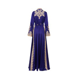 Back view of the Mijade Fashion royal blue kaftan showing the gold embroidery detail on the upper back and the elegant floor-length flow of the fabric.