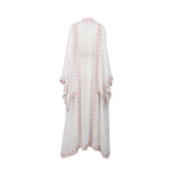 Back view of a Mijade Fashion floor-length white chiffon kaftan showing the embroidered trim along the cape-style sleeves and hem.